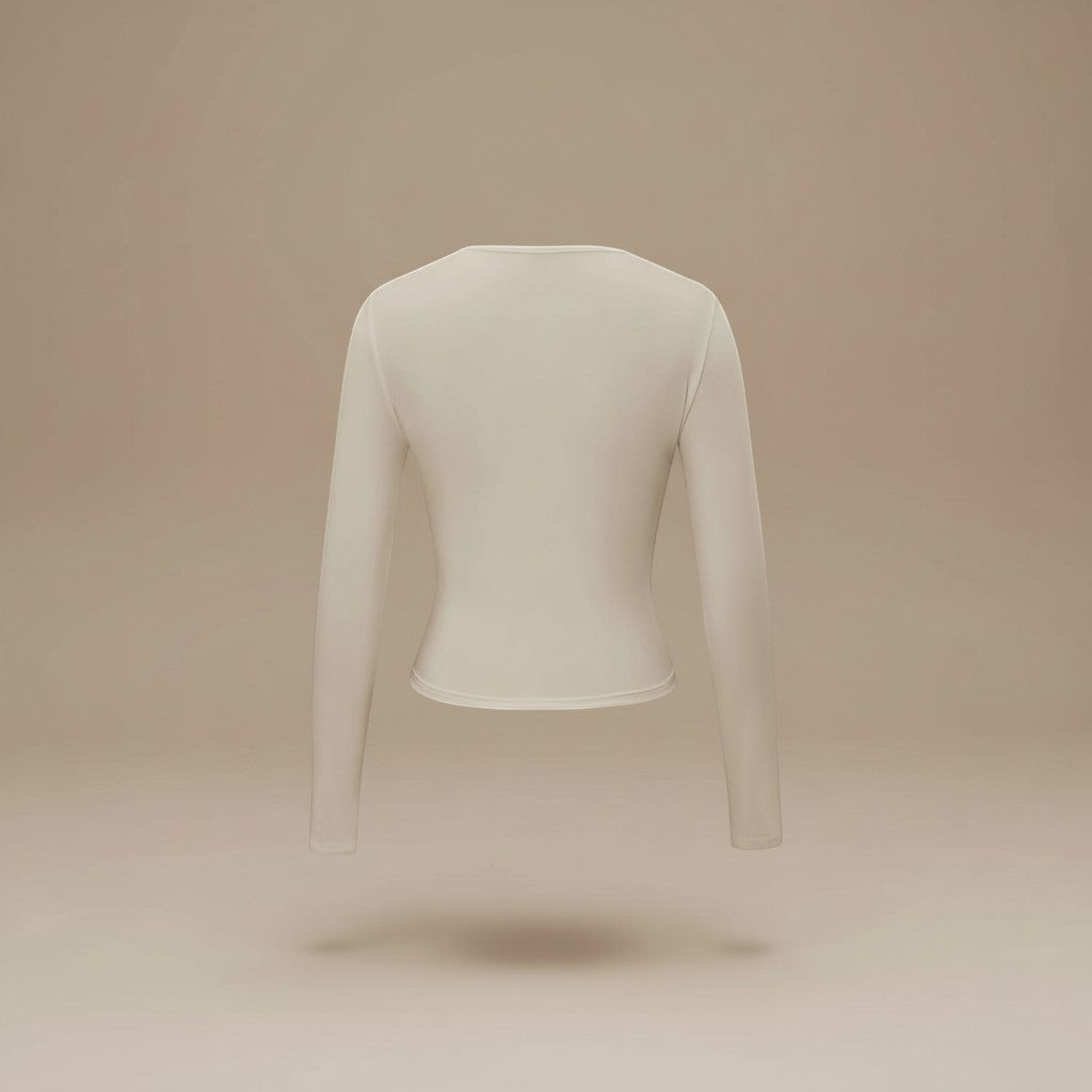 Yemelia beige long sleeve fitted crop top with thumbhole cuffs and clean neckline, made from soft stretchy fabric.