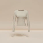Yemelia beige long sleeve fitted crop top with thumbhole cuffs and crew neck, made from soft stretch fabric.
