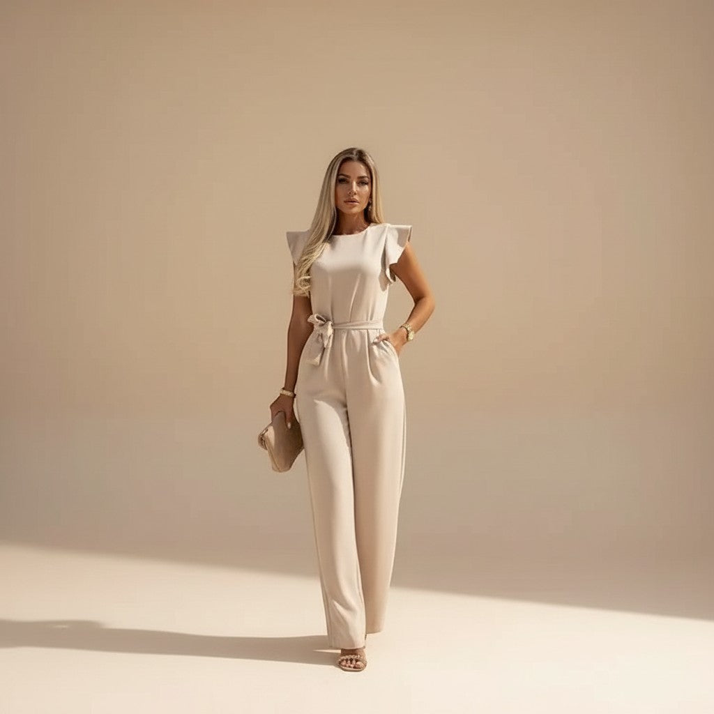 Yemelia beige flutter sleeve wide leg jumpsuit with adjustable waist tie, perfect for formal events.
