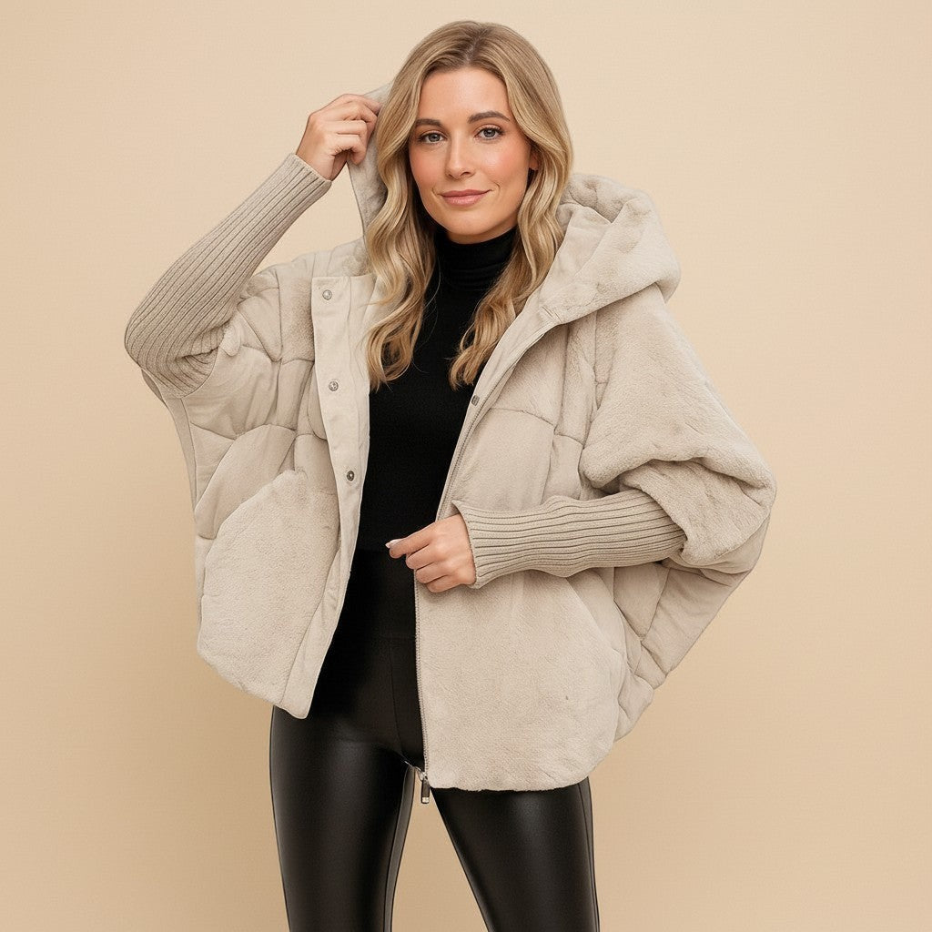 Yemelia oversized beige hooded puffer jacket with textured finish and ribbed cuffs.