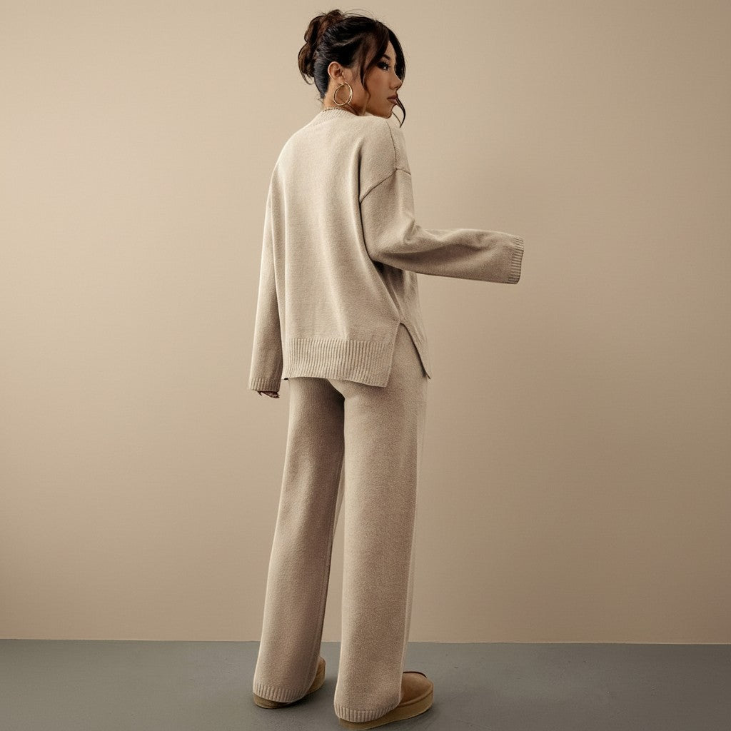 Yemelia beige knit lounge set with relaxed fit sweater and wide leg pants. Soft knit fabric with ribbed details.