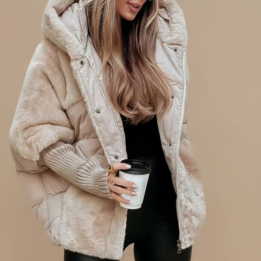 Yemelia oversized beige hooded puffer jacket with soft textured finish and ribbed cuffs.