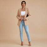 Yemelia beige open front tailored blazer with a modern slim fit and sleek front pockets.