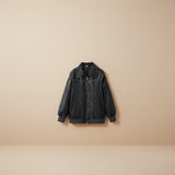 Yemelia black faux leather bomber jacket with zip front, ribbed trim, and contrast stitching. Ideal for casual wear.