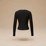 Yemelia black long sleeve fitted crop top with thumbhole cuffs, made from soft stretchy fabric.
