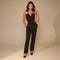 Yemelia black tailored jumpsuit with deep V halter neck and straight leg.