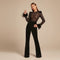 Yemelia black lace jumpsuit with feather cuffs, structured shoulders, and flared legs. Elegant evening wear.
