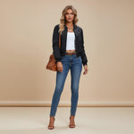 Yemelia black diamond quilted zip front jacket with ribbed trim and side pockets.