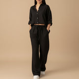 Yemelia black relaxed fit button-down shirt and wide-leg pants set, lightweight fabric, drawstring waist.
