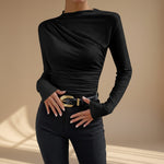 Yemelia black long sleeve fitted top with asymmetrical neckline and ruched detailing. Soft stretch fabric.