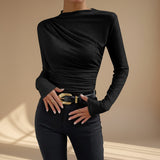 Yemelia black long sleeve fitted top with asymmetrical neckline and ruched detailing. Soft stretch fabric.