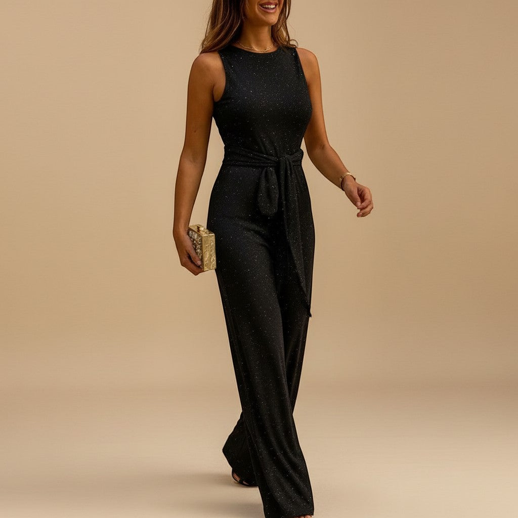 Yemelia black sleeveless sequin wide leg jumpsuit with waist tie, perfect for evening events.
