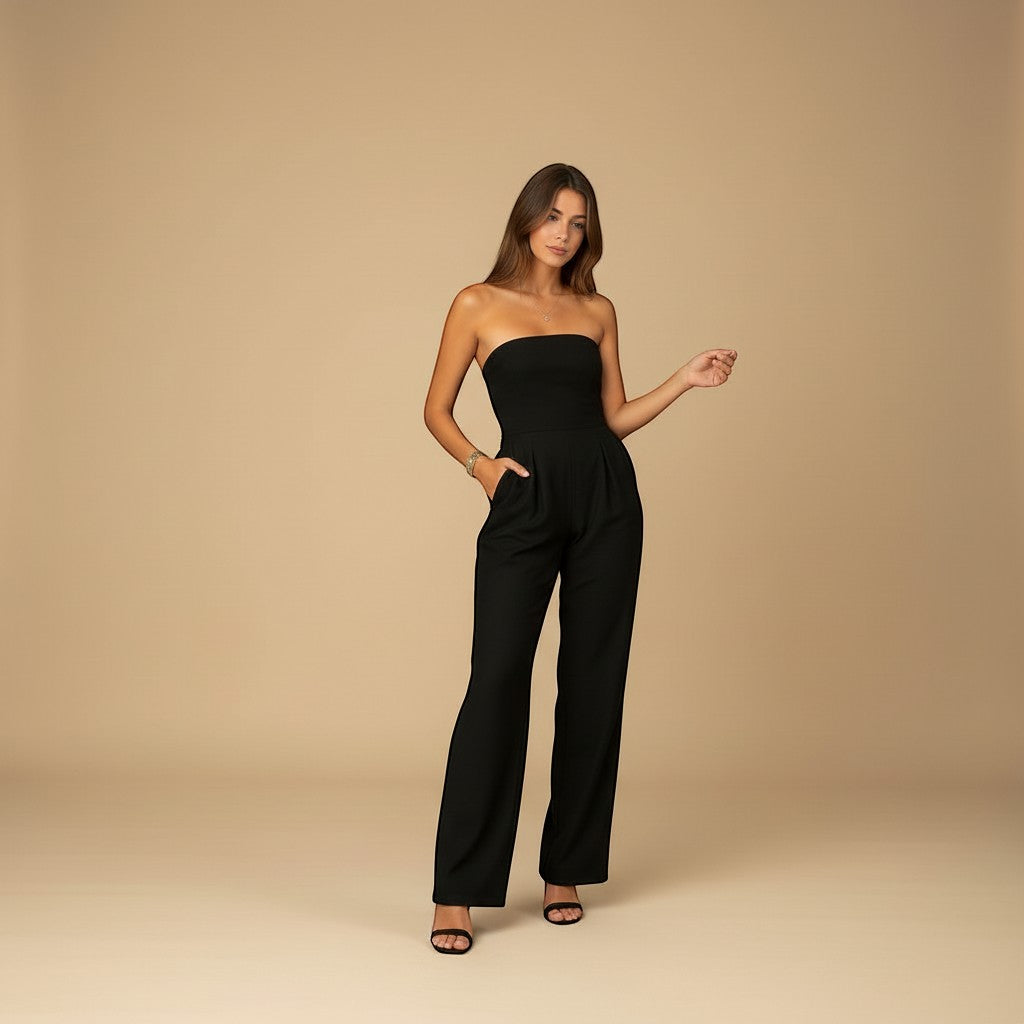 Yemelia black strapless wide leg jumpsuit with tailored fit and side pockets, perfect for formal events.
