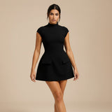 Yemelia black structured mini dress with high neck, cap sleeves, and decorative flap pockets.