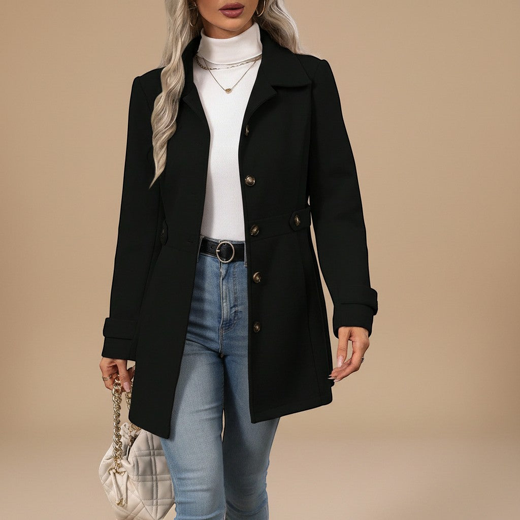 Yemelia black tailored mid-length coat with button front, classic collar, and waist belt. Made from a structured fabric.