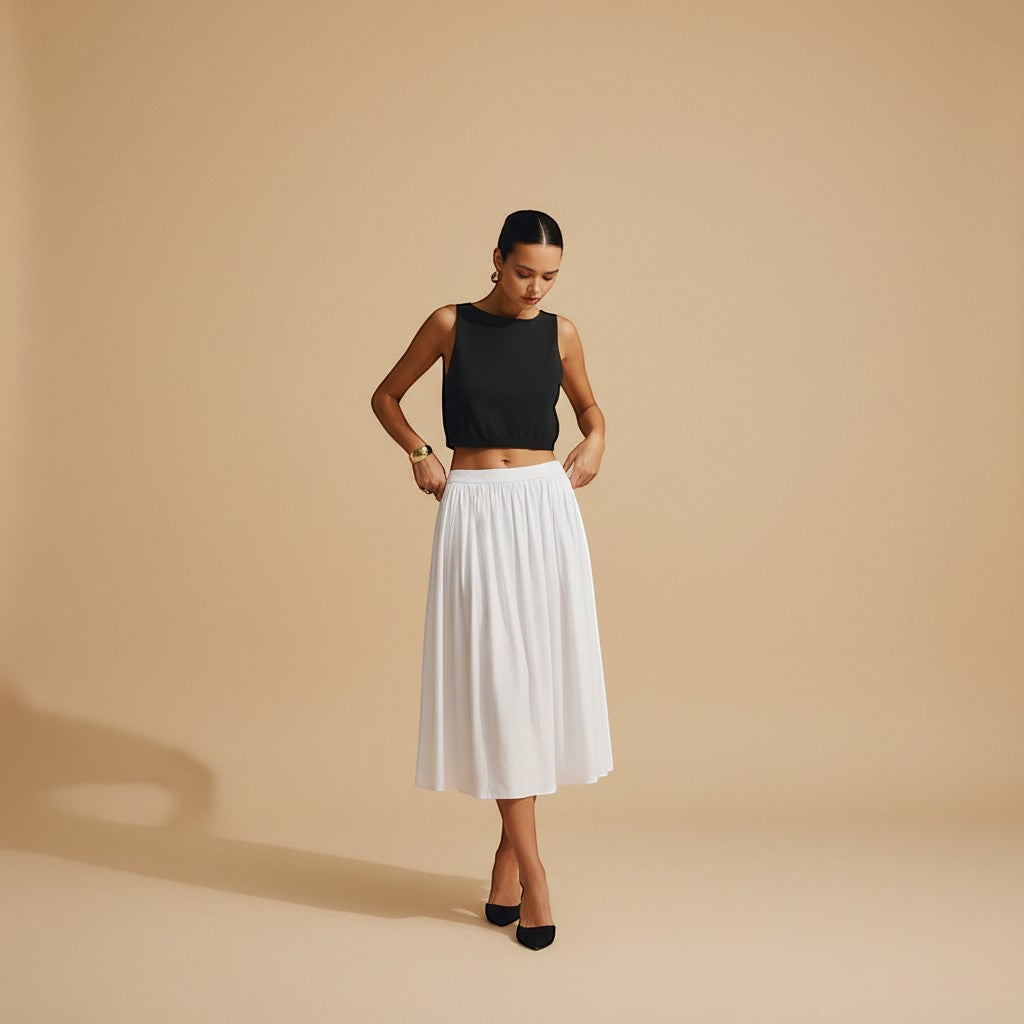 Yemelia black sleeveless textured crop top with clean neckline, perfect for casual wear.