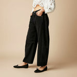Yemelia black denim wide leg jeans with relaxed fit and five-pocket styling.