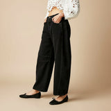 Yemelia black denim wide leg jeans with relaxed fit and five-pocket styling.