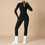 Yemelia black long sleeve zip front sculpting one piece jumpsuit with a high neckline and full-length fit.