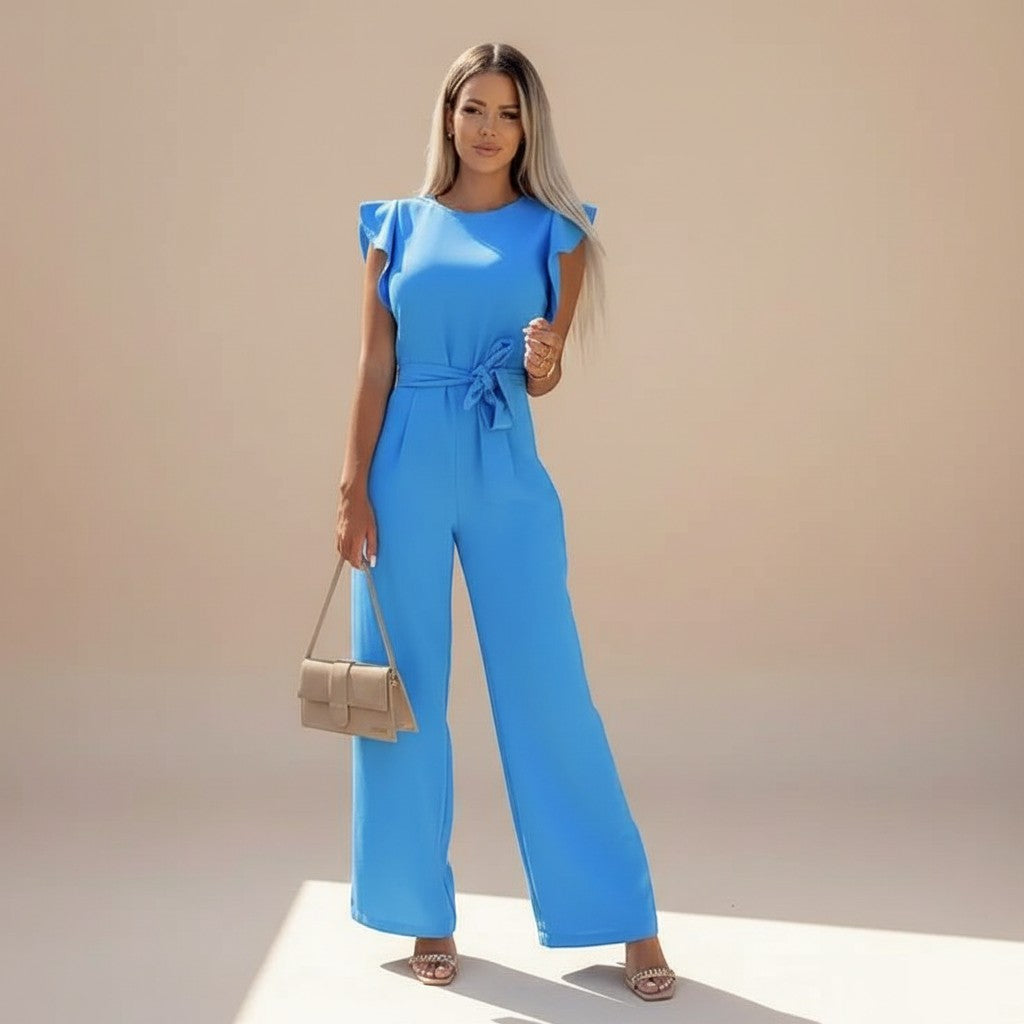 Yemelia blue flutter sleeve wide leg jumpsuit with adjustable waist tie and full-length legs. Ideal for events.