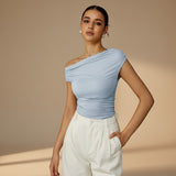 Yemelia light blue ruched one-shoulder fitted top with asymmetrical neckline and stretch fabric.