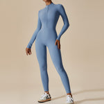 Yemelia light blue long sleeve zip front sculpting one piece jumpsuit with a sleek, body-contouring fit.