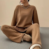 Yemelia brown knit lounge set with crewneck sweater and wide leg pants, featuring ribbed cuffs and hem.