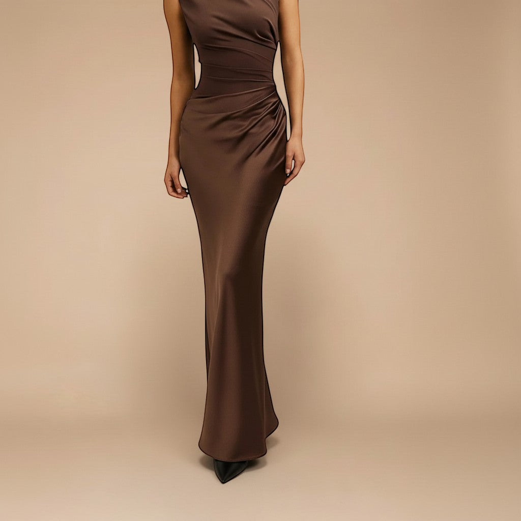 Yemelia brown satin one shoulder evening gown with sculpted fit and floor-length silhouette.