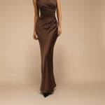 Yemelia brown satin one shoulder evening gown with sculpted fit and floor-length silhouette.