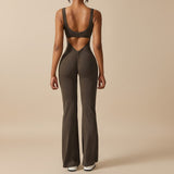 Yemelia sleeveless brown sculpting flared leg jumpsuit with ruched detail and open back.