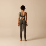 Yemelia sleeveless brown sculpting flared leg jumpsuit with ruched back detail and open back.