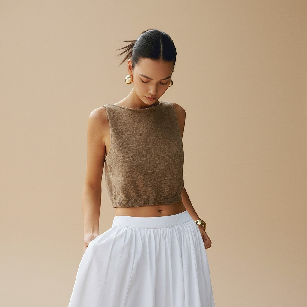 Yemelia sleeveless brown textured knit crop top with clean neckline and structured fit.