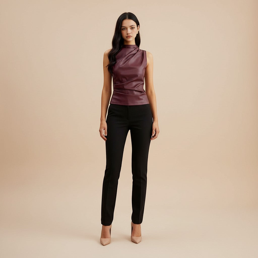 Yemelia sleeveless draped faux leather top in deep burgundy with a high neckline and flattering fit.