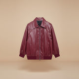 Yemelia burgundy faux leather bomber jacket with zip front, ribbed trim, and collared neckline.