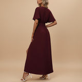 Yemelia burgundy V neck flutter sleeve maxi dress with defined waist and side slit.