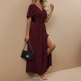 Yemelia burgundy V neck flutter sleeve maxi dress with defined waist and high slit. Elegant evening wear.