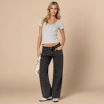 Yemelia mid rise wide leg denim jeans in charcoal grey, featuring a relaxed fit and five-pocket design.