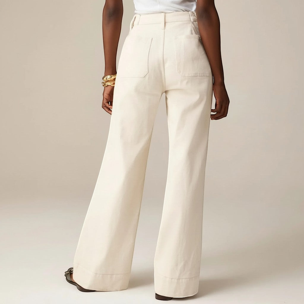 Yemelia cream high waist wide leg denim pants with utility pockets and a relaxed silhouette.