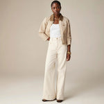 Yemelia high waist wide leg cream denim pants with utility pockets and a relaxed silhouette.