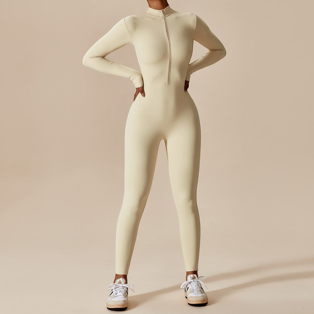 Yemelia cream long sleeve zip front sculpting one piece jumpsuit with full-length legs and high neckline.