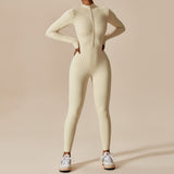 Yemelia cream long sleeve zip front sculpting one piece jumpsuit with full-length legs and high neckline.