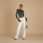 Yemelia dark grey long sleeve fitted top with thumbhole detail and crew neck, made from stretch fabric.