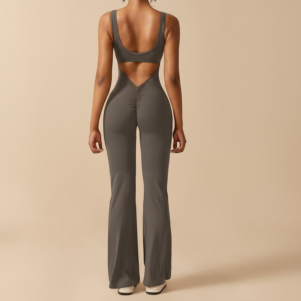 Yemelia dark grey sleeveless sculpting flared leg jumpsuit with ruched detail and open back.