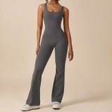 Yemelia dark grey sleeveless sculpting flared leg jumpsuit made of smooth, stretchy fabric.