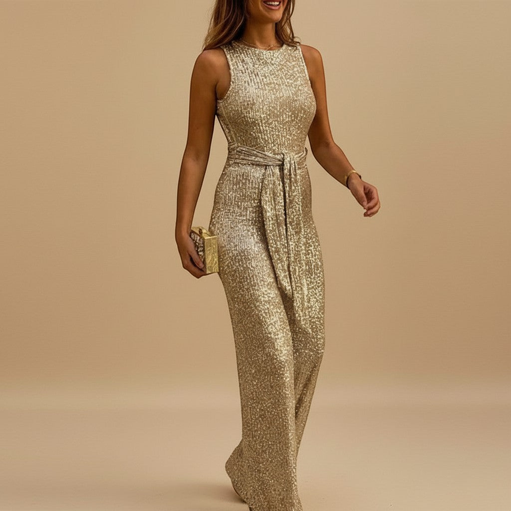 Yemelia gold sequin sleeveless wide leg jumpsuit with waist tie, perfect for evening events.