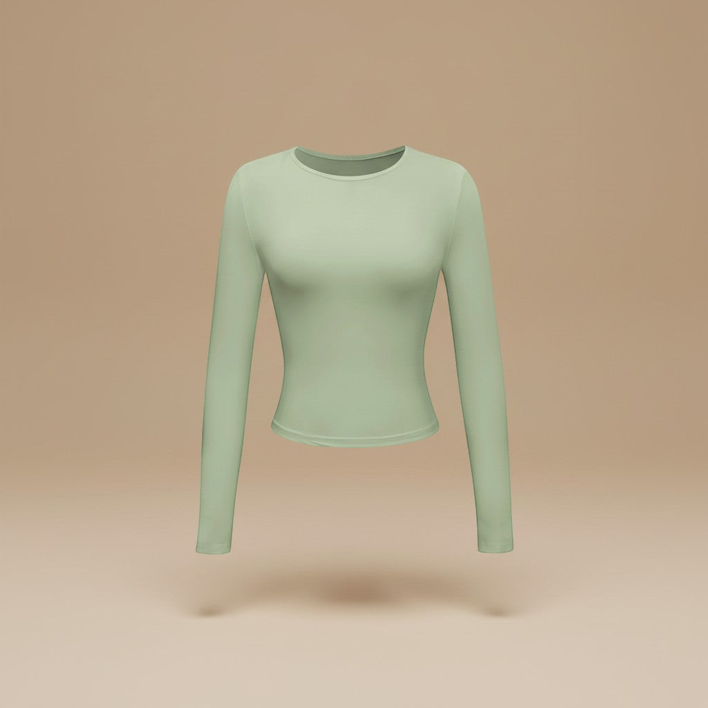 Yemelia light green long sleeve fitted crop top made from soft, stretchy fabric with thumbhole cuffs.