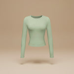 Yemelia light green long sleeve fitted crop top made from soft, stretchy fabric with thumbhole cuffs.