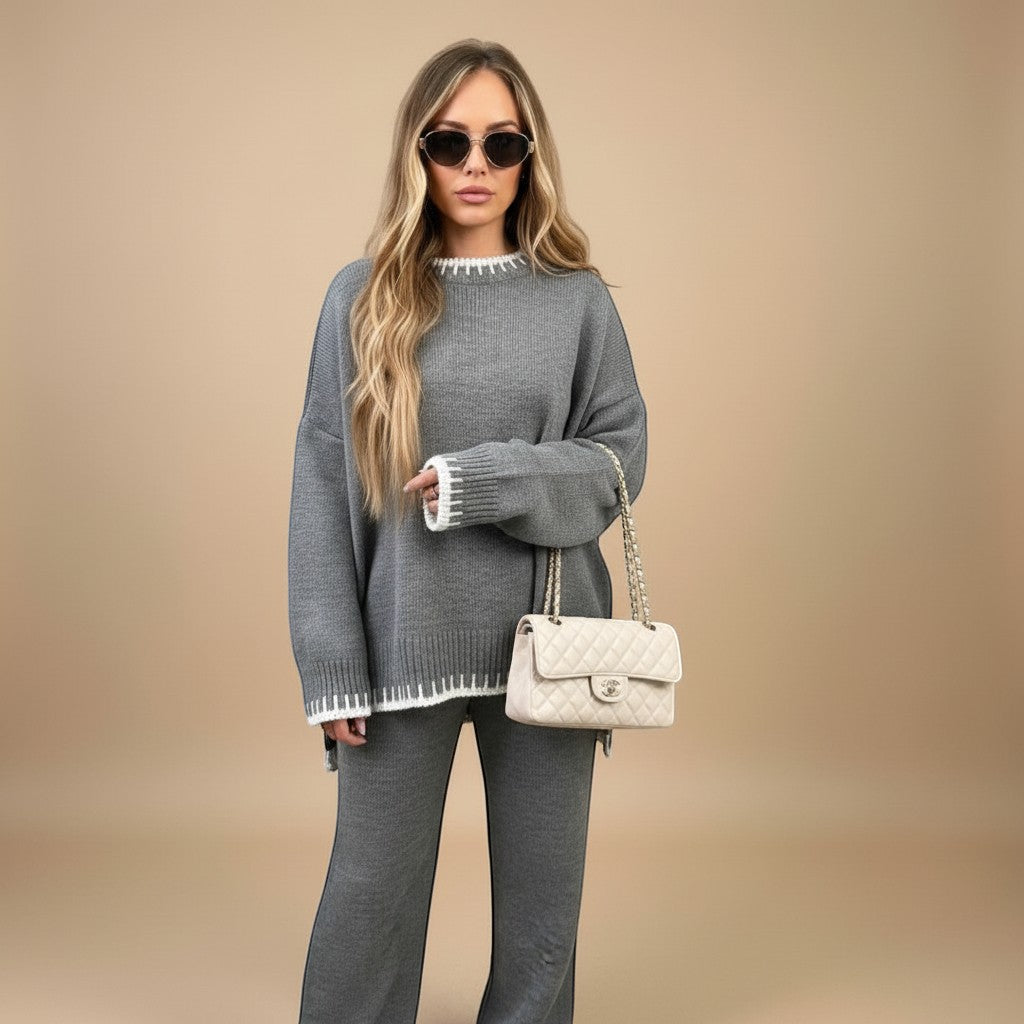 Yemelia grey knit sweater set with oversized top and wide leg pants, featuring contrast trim detail. Soft knit fabric.