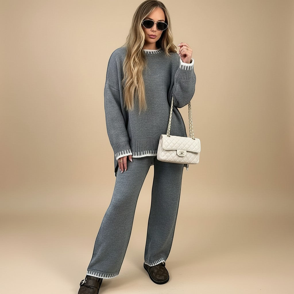 Yemelia grey knit set with oversized sweater and wide leg pants, featuring contrast trim detail. Soft knit fabric.