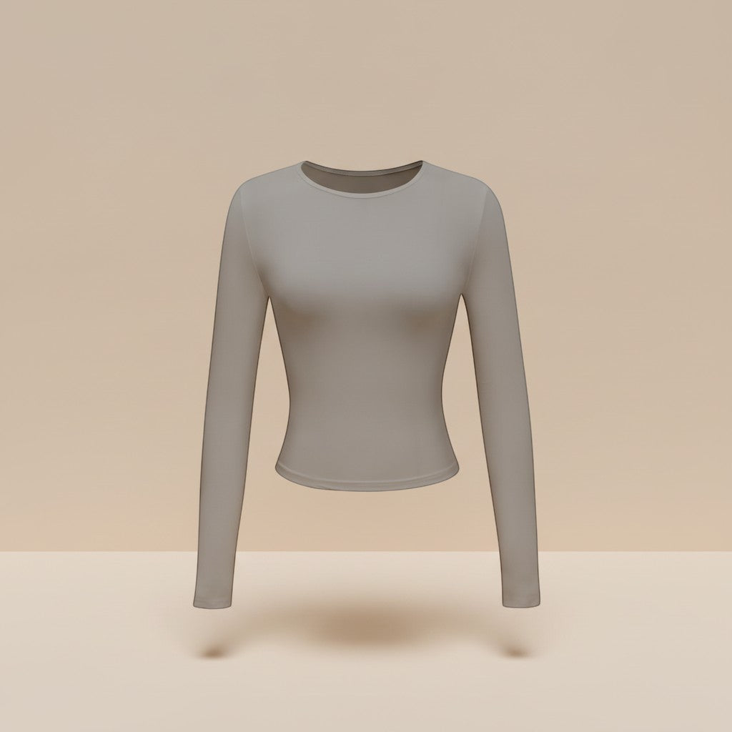 Yemelia grey long sleeve fitted crop top with thumbhole cuffs and crew neck, made from soft stretchy fabric.